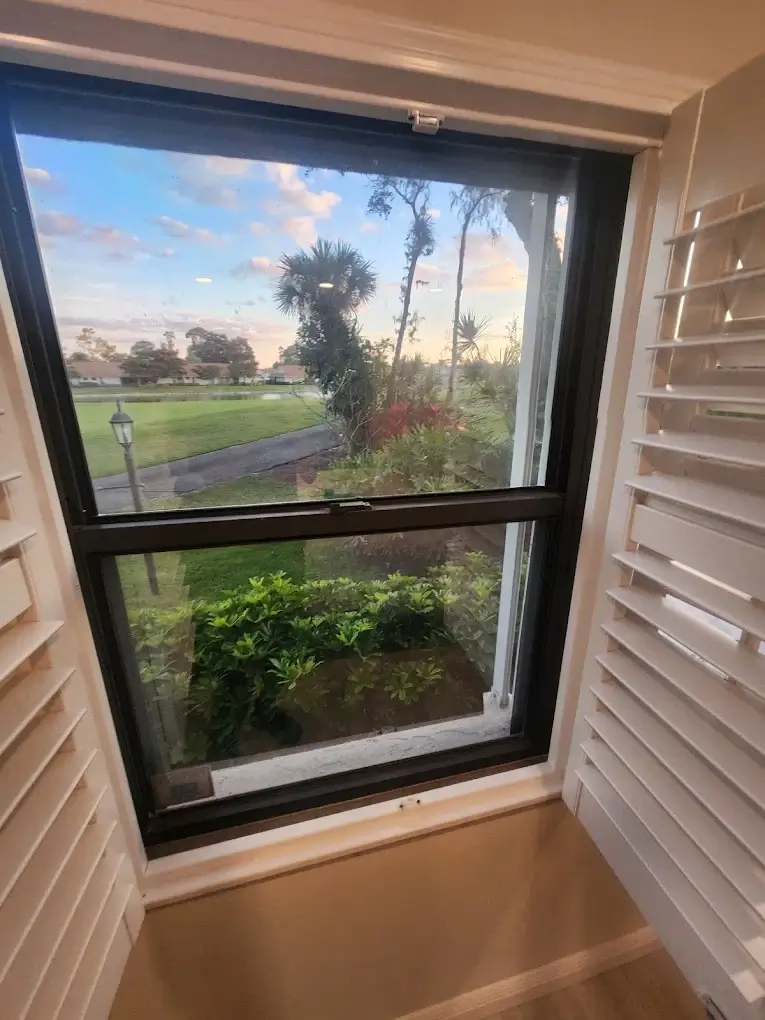 Freshly repaired window with a clear garden view in Cape Coral, FL